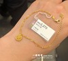 香港六福珠宝990足金，黄金镂空拉丝圆形，双层手链黄金手链