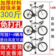 。自行车墙上挂架家用顶天立地架墙免打孔支架室内单车立式停车架