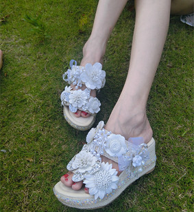欧洲站夏季坡跟女士真皮凉拖 原创设计花朵甜美草编鱼嘴凉鞋