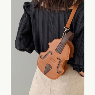 可爱搞怪双肩背包包女2024潮，时尚手提单肩包网红斜挎小提琴包