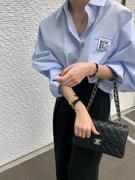 韓国東大门时尚纯色翻领长袖淑女胸口小贴标设计宽松单排扣衬衫女