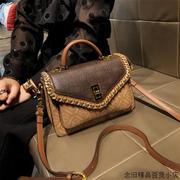 香港品牌包包女2024春夏复古真皮斜跨小包质感手提单肩小方包
