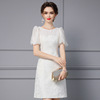 轻奢白色连衣裙2023女夏装正式场合精致珍珠提花高腰A字裙子