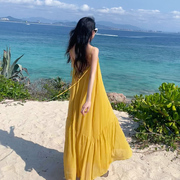 泰国三亚旅游穿搭拍照沙滩裙女海边度假超仙黄色露背吊带连衣长裙