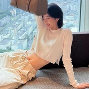 白色针织衫女2022春秋短款设计感镂空绑带圆领露背上衣