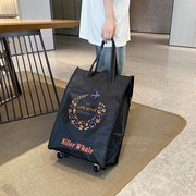 大容量行李包带滑轮手提袋，外出装衣物收纳袋，购物可折叠拖拉旅游包