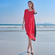 红色连衣裙女秋季2023显瘦长款，过膝大摆脚踝气质沙滩长裙收腰