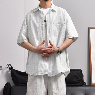 日系少年感淡蓝色条纹衬衫镂空设计感夏天短袖外套轻薄款衬衣男潮