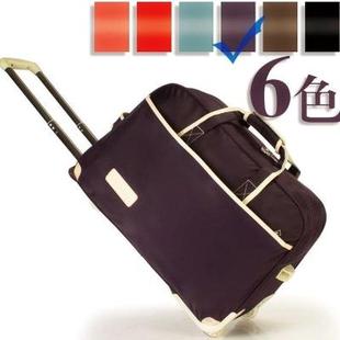 。时尚拉杆包带轮子可女式旅行包版拖包以拉的手提包行礼箱男