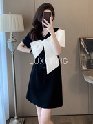 luxcraig法式蝴蝶结拼接连衣裙夏季洋气露肩小个子，时尚小黑裙