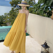 度假风黄色大理海边度假露背吊带连衣裙雪纺时尚设计感宽松长裙