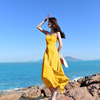 吊带长裙女夏季海边度假黄色沙滩裙气质性感露背长款雪纺连衣裙