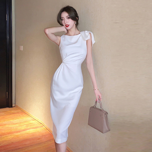 白色无袖连衣裙高级感小众，设计感女夏季名媛风法式蝴蝶结吊带礼服