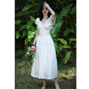 2024夏季茶歇法式V领收腰连衣裙白色设计感别致大摆气质裙子