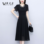 黑色连衣裙2024夏气质(夏气质)名媛，高端女神范高级(范，高级)感显瘦雪纺中长裙子