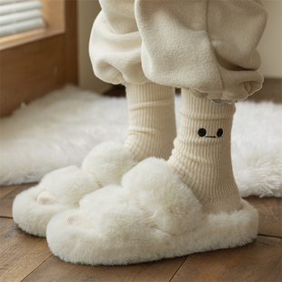 羊绒袜子女秋冬中筒袜加绒保暖刺绣眼睛长袜加厚黑白堆堆长筒袜