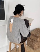 Exclusive type韩国简约通勤设计心机镂空露背宽松圆领针织毛衣衫
