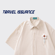 TRAVEL ISSUANCE 小白花标签 日系小清新学院风纯色宽松短袖衬衫
