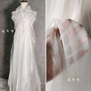 白色雪纱 珠光设计师欧根纱布料 服装礼服婚庆背景花束纱幔面料