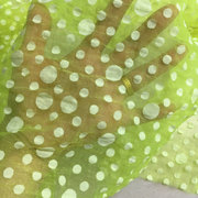 亲肤飘逸半透微廓天丝欧根纱大小圆波点提花面料果绿色设计师布料