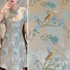 浅蓝色玉兰花喜鹊鸟织锦缎提花，面料中国风，旗袍外套马甲裙子布料