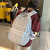 日系双肩包女生(包女生)2024小清新格子书包，文艺初中高中学生旅游背包