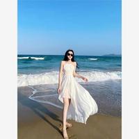 海边度假连衣裙白色超仙沙滩，裙三亚旅行穿搭法式气质露背吊带长裙