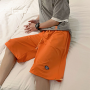 港风夏装宽松纯色大码标牌休闲短裤子-橘色 DK986 P35