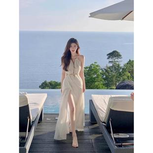泰国三亚旅游拍照沙滩裙，海边度假连衣裙纯欲性感，镂空白色吊带长裙