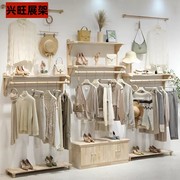 女装店服装店展示架童装实木，上墙壁挂衣架衣服，店装修效果图货展架