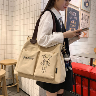 ins尼龙布水桶(布水桶，)包日韩版单肩包女高中大学生，手提袋古着感斜挎大包