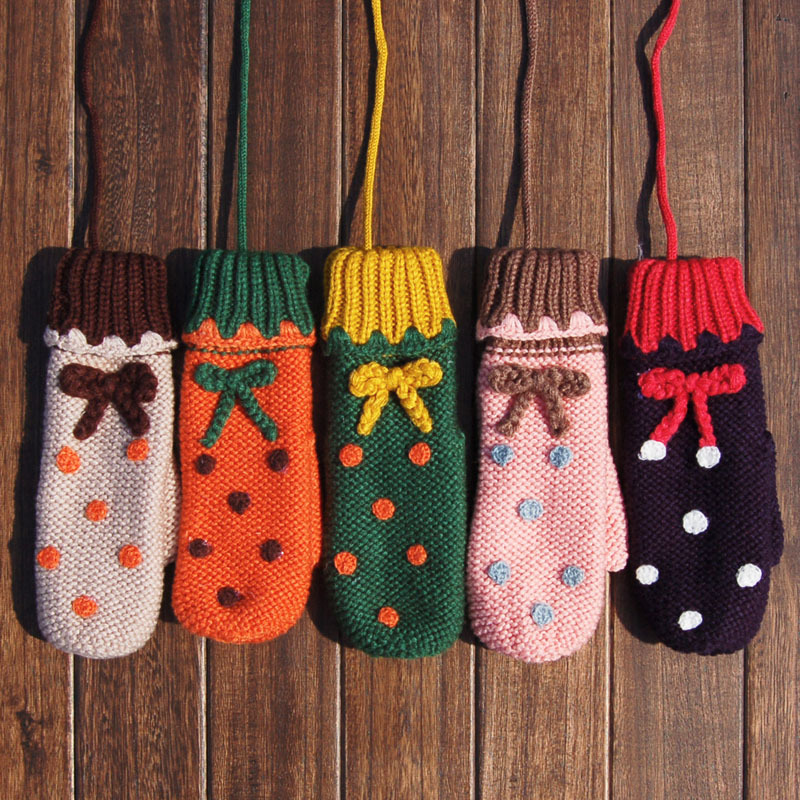 女蝴蝶结圆波点撞色...