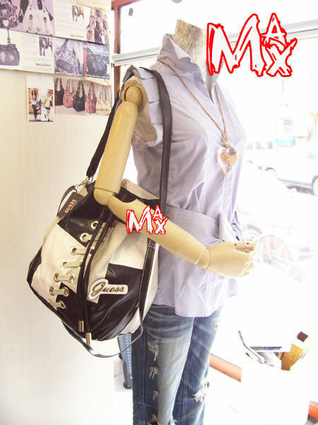 GUESS-2010年新品,橄榄球风格穿绳桶型包,单肩包