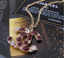 Sección de fragantes pequeño con el logo clásico contador de flash de rubí de 24 quilates de diamantes Collar chapado en oro de calor