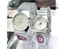 Tabla [57357] relojes de acero noble y generoso par de Año Nuevo Lunar de Promoción de Año Nuevo la venta caliente